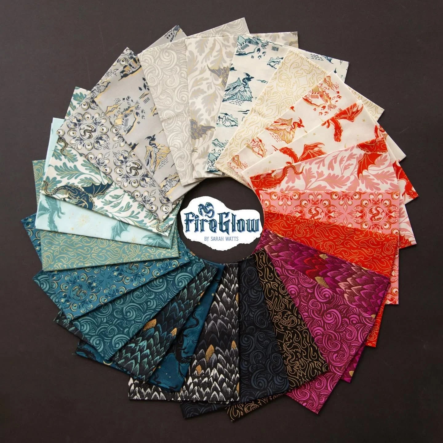 Collection of patterned fabric hand cut fat Quarters arranged in a circular display with 'FireGlow' branding by Ruby Star Society